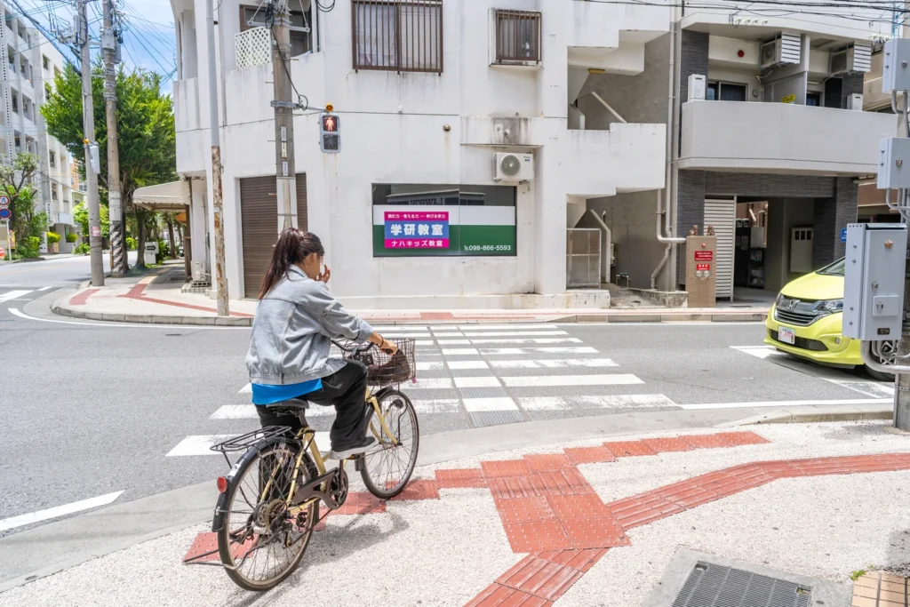 Woman in long clothing in Miebashi on June 15, 2025, in Okinawa