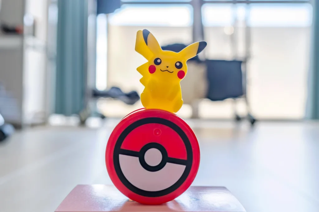 This is a Pikachu roly-poly toy from the Pokémon Happy Meal at McDonald's Japan. It moves without tipping over when pushed sideways due to its wheel-like shape.