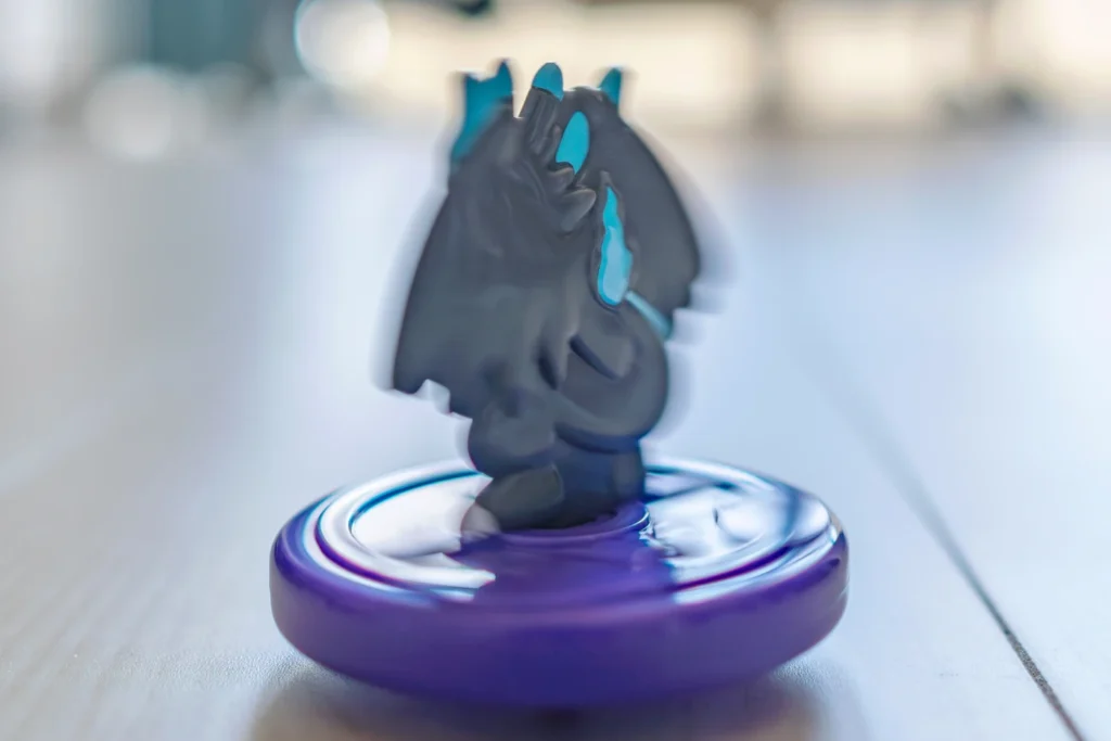 When you spin the Pokémon toy from the Japanese McDonald's Happy Meal, it rotates like this, and since the bottom part is shaped like a rounded peg, it's not dangerous.