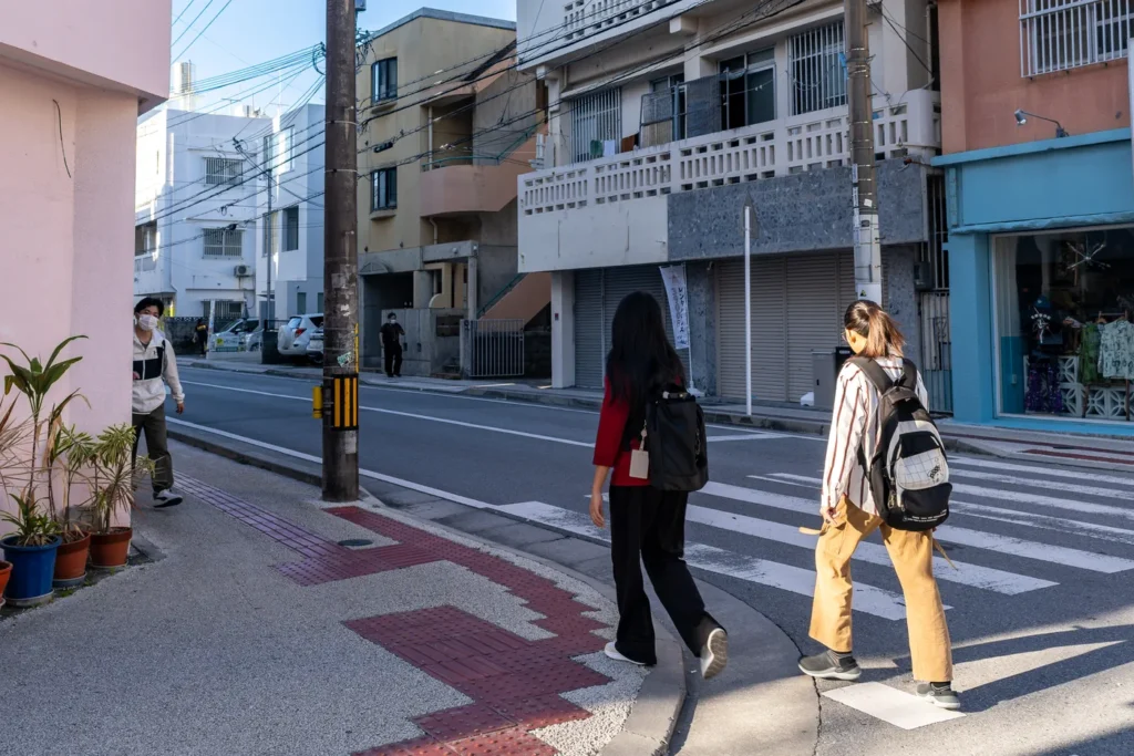 People wearing kimonos in the morning in Miebashi, Okinawa